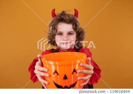 Cute demon waiting for Halloween treats Cute demon waiting for Halloween treats 119616804