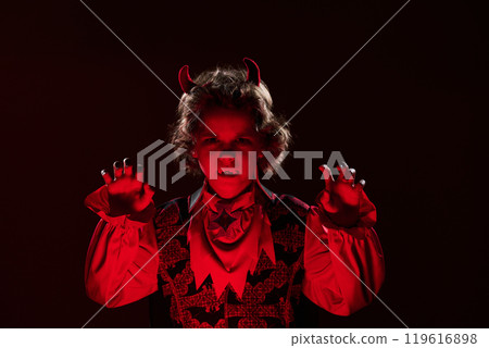 Scary little vampire with fangs 119616898