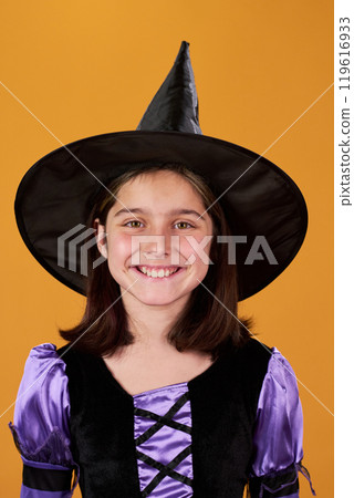 Child in costume of Halloween witch Child in costume of Halloween witch 119616933