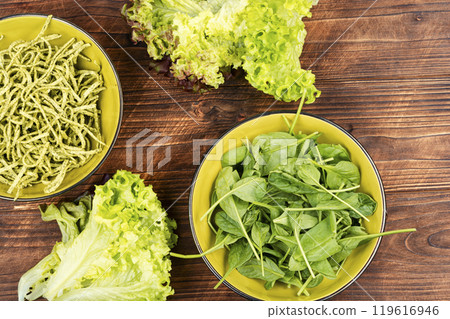 Tasty pasta with spinach. 119616946