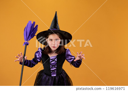 Cute little witch growling in isolation 119616971