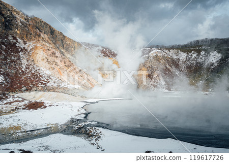 Steam hot springs and snow scene in Noboribetsu Hell Valley, Hokkaido, Japan 119617726