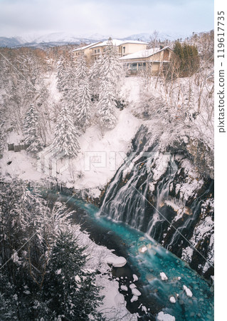 Snowy scene and blue river at Shirasu Falls in Biei, Hokkaido, Japan in winter 119617735