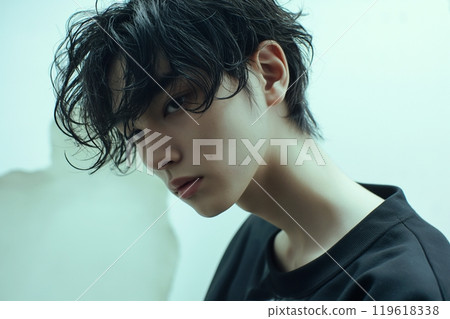 AI-generated image of a man having his hair colored at a salon 119618338