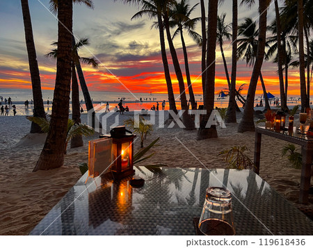 Colorful sunset on Boracay Island observed from a beach restaurant. High quality photo 119618436