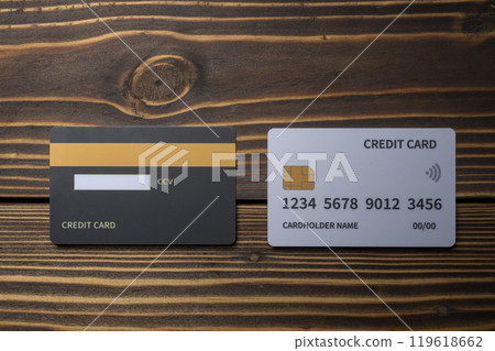 Top view of debit or credit card on wooden background 119618662