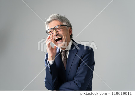 Businessman, gray hair, hilarious Businessman, gray hair, hilarious 119619011