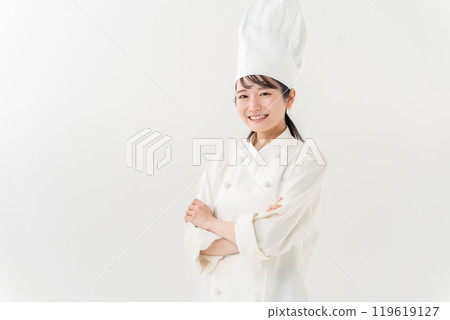穿著廚師服、戴著廚師帽的婦女 119619127