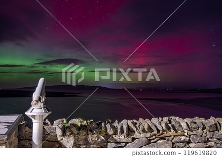 The Aurora Borealis, the northern lights, showing up in Portnoo, County Donegal, Ireland. The Aurora Borealis, the northern lights, showing up in Portnoo, County Donegal, Ireland. 119619820