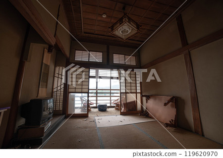 A guest room in an abandoned inn A guest room in an abandoned inn 119620970