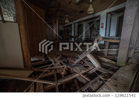 The interior of an abandoned inn 119621542