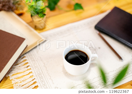 Coffee and books on the table Coffee and books on the table 119622367