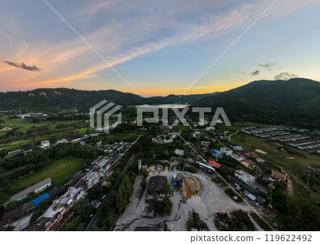 Aerial view of residential houses and driveways neighborhood during in sunset time.High angle view over building houses in phuket thailand 119622492