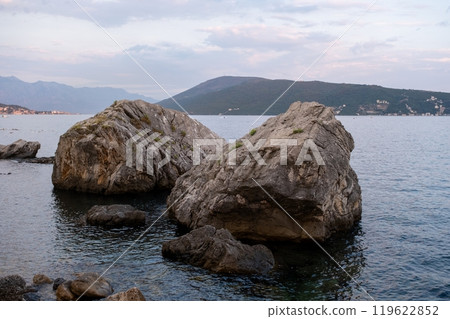 Large rocks by the coastal shoreline at dusk. Bay of Kotor 119622852