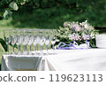 Outdoor Wedding Reception with Champagne Glasses 119623113