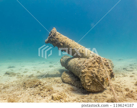 Two old cannons as a part of an artificial reef in the Adriatic Sea. Beautiful turquoise water 119624187