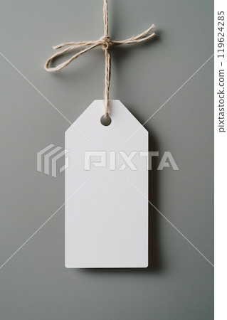 A white rectangular tag mockup, hanging on a string, on a solid background. A white rectangular tag mockup, hanging on a string, on a solid background. 119624285