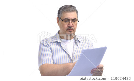 Man in Glasses Reading Business Documents 119624423
