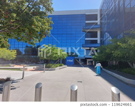 San Jose, California, USA - 09.11.2023: The Intel logo is visible in front of the Robert Noyce Building at the Intel Corporation headquarters in Santa Clara, California. San Jose, California, USA - 09.11.2023: The Intel logo is visible in front of the Robert Noyce Building at the Intel Corporation headquarters in Santa Clara, California. 119624661