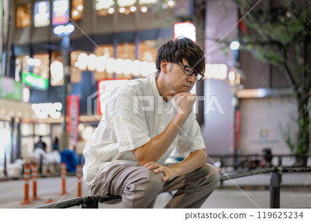 A man thinking in the city A man thinking in the city 119625234