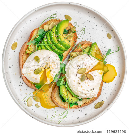 avocado sandwich with poached egg with flowing yolk on plate isolated on white background. top view avocado sandwich with poached egg with flowing yolk on plate isolated on white background. top view 119625298