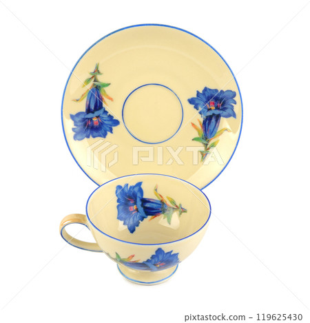 Vintage porcelain cups and saucers isolated on white. Vertical photo. 119625430