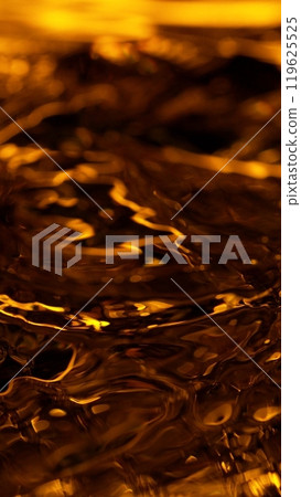 Detail of Dark Golden Liquid Waves Surface. Detail of Dark Golden Liquid Waves Surface. 119625525