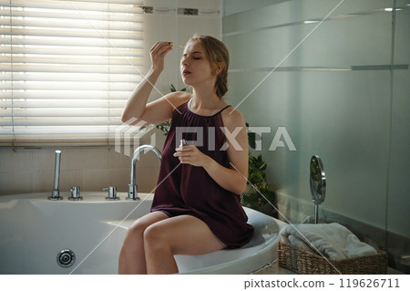 Relaxing Morning Ritual in Bathtub Setting Relaxing Morning Ritual in Bathtub Setting 119626711