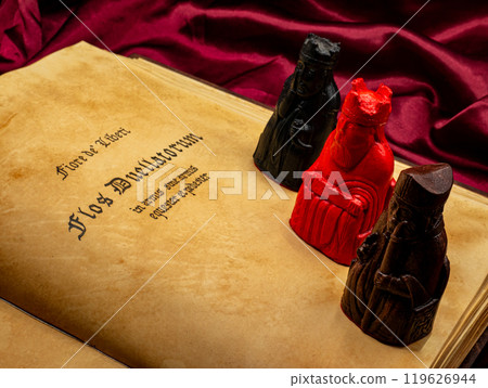 Medieval fencing book with the text and the name of the author Fiore Dei Liberi master of combat with pawns of the King and Queen 119626944