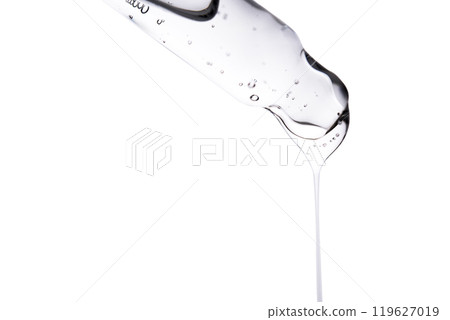 Dropper pipette with delicious serum with bubbles close-up. Dropper pipette with delicious serum with bubbles close-up. 119627019