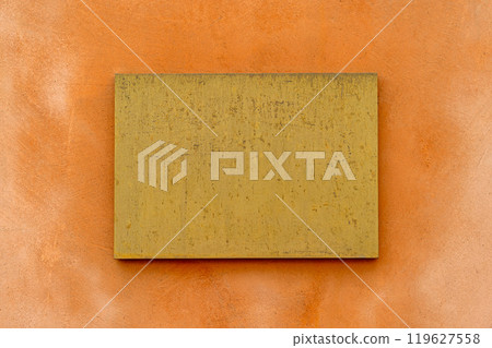 Golden Plaque Orange Wall 119627558
