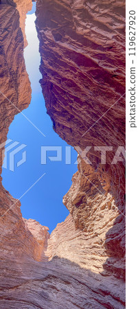 Panoramic view of blue sky is seen between the rock formations in Salta, Arg. 119627920