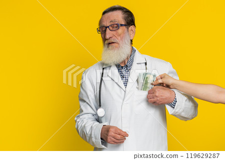 Doctor man receive bribe from patient, taking money from client, hiding cash into pocket, corruption 119629287