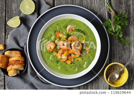 Shrimps in Culichi Salsa or Poblano sauce in bowl 119629644