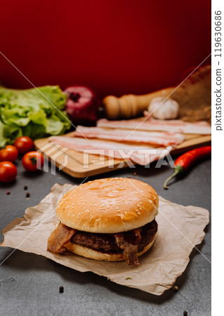 Juicy bacon burger with fresh ingredients, perfect for fast food lovers and gourmet enthusiasts Juicy bacon burger with fresh ingredients, perfect for fast food lovers and gourmet enthusiasts 119630686