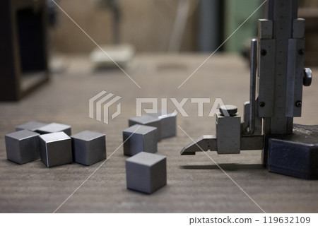 Using a height gauge to mark the location where holes will be drilled 119632109