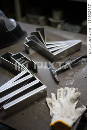 Stainless steel parts being welded Stainless steel parts being welded 119632427