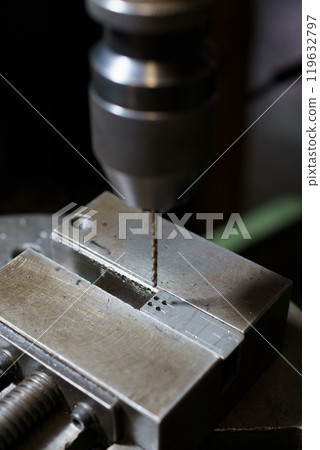 Drilling with drilling machine Drilling with drilling machine 119632797