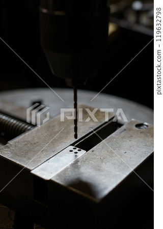 Drilling with drilling machine Drilling with drilling machine 119632798