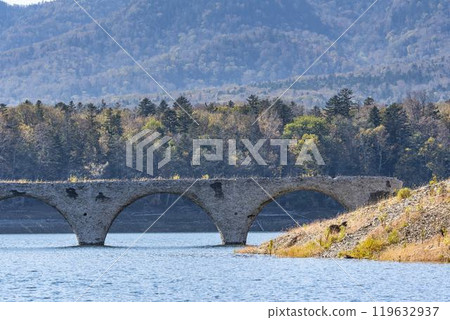 Taushubetsu River Bridge on the former Shihoro Line of the Japanese National Railways on a clear autumn day in Kamishihoro, Hokkaido 119632937