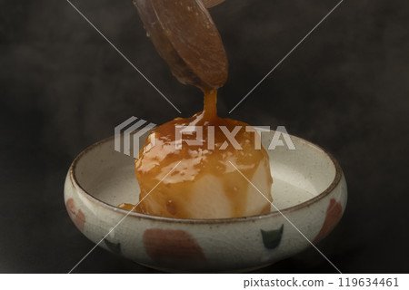 Steamed Daikon: Simmered daikon radish with miso sauce 119634461