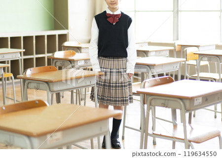 Portrait of a Japanese female junior high school student standing in a classroom Portrait of a Japanese female junior high school student standing in a classroom 119634550