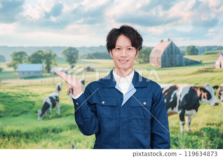 Young man working on a farm Young man working on a farm 119634873