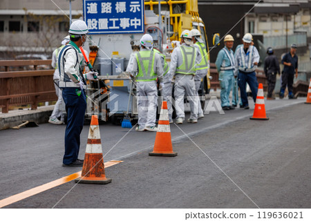 Road repair workers and traffic controllers Road repair workers and traffic controllers 119636021