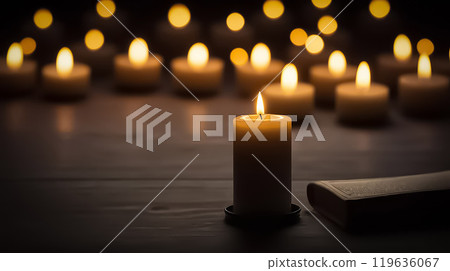 Stunning array of glowing candles forming rows and casting warm light, ideal for creating a peaceful and spiritual ambiance. Perfect for meditation, reflection, or romantic settings 119636067