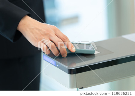 Security gate at hand 119636231