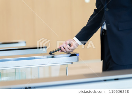 Security gate at hand 119636258