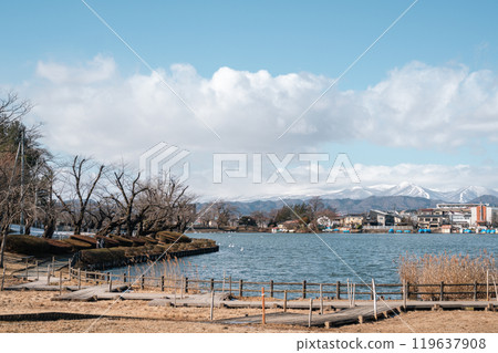 Takamatsu Pond and snowy mountain in Morioka, Iwate, Japan 119637908
