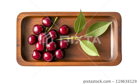 Flatlay fresh cherries colorful in a wooded tray on white isolated background. Flatlay fresh cherries colorful in a wooded tray on white isolated background. 119638129