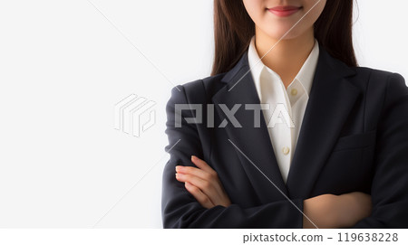 A young Japanese businesswoman with her arms crossed 119638228